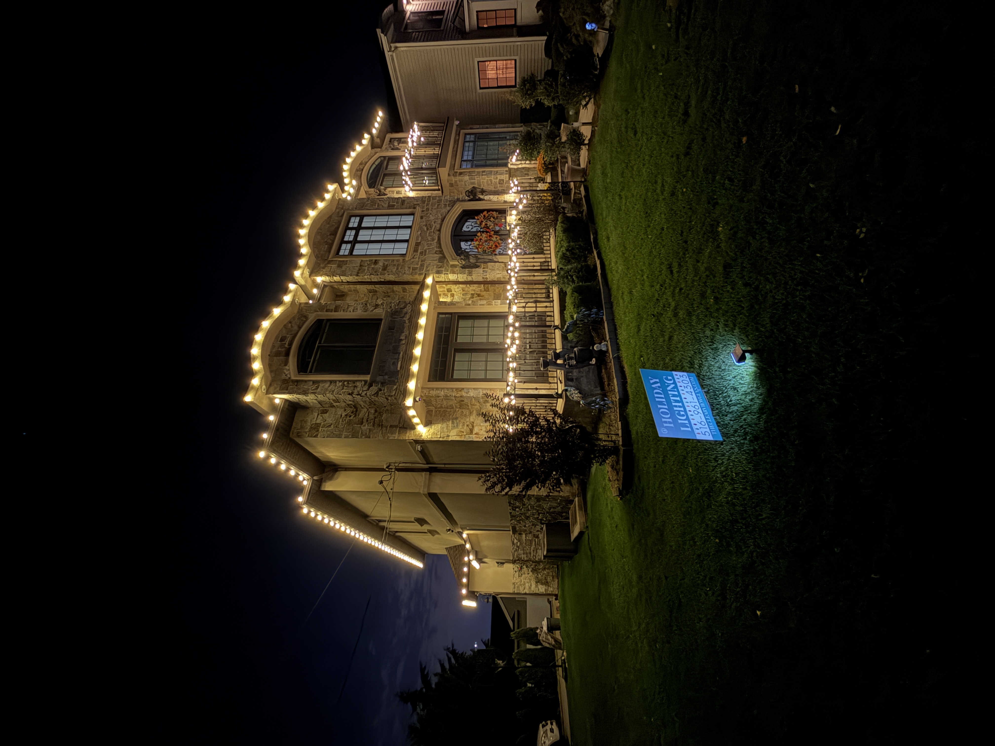 Home with professional holiday lighting on Long Island